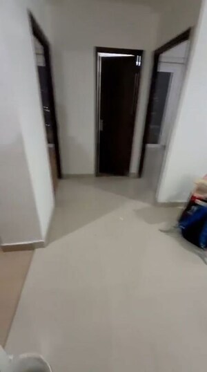 Building Lobby in 3 BHK Apartment at Amrapali Crystal Homes, Sector 76 – for Rent