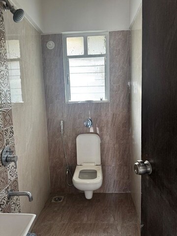 Bathroom in 1 BHK Apartment at Karan Ceto, Wadgaon Sheri – for Rent