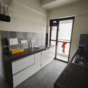 Kitchen in 2 BHK Apartment at Cosmopolis Tower, Andheri West – for Rent