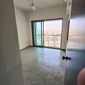 Bedroom in 2 BHK Apartment at Cosmopolis Tower, Andheri West – for Rent