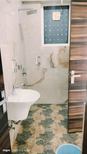 Bathroom in 3 BHK Builder Floor at Dhakoli – for Rent