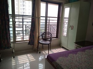 Room in 1 BHK Apartment at Suyog CHS Goregaon West, Goregaon West – for Rent