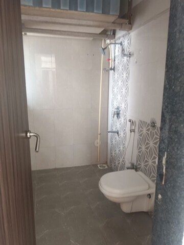 Bathroom in 2 BHK Apartment at Mutha Sai Nirvana, Shahad – for Rent