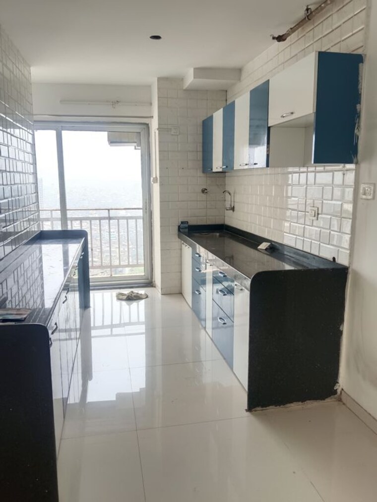 Kitchen, mutha-sai-nirvana 2 Bedroom 1085 Sq.Ft. Apartment In Shahad Thane 9911413