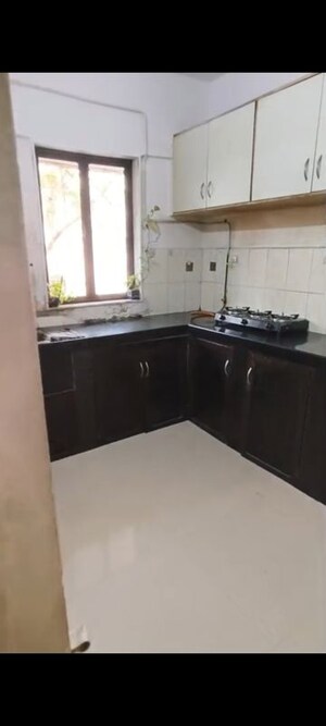 Kitchen in 1 BHK Apartment at Nagnath CHS, Andheri West – for Rent