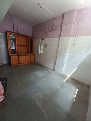 Room in 1 BHK Apartment at Shankar Darshan CHS, Dhankawadi – for Rent