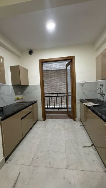 Kitchen in 1 BHK Apartment at Palm Residency Chhatarpur, Rajpur Khurd Extension – for Rent