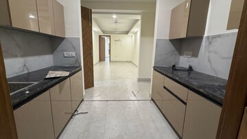 Kitchen in 1 BHK Apartment at Palm Residency Chhatarpur, Rajpur Khurd Extension – for Rent