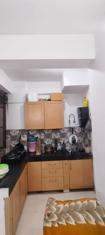 Kitchen in 1 BHK Apartment at Signature Global Synera, Sector 81 – for Sale