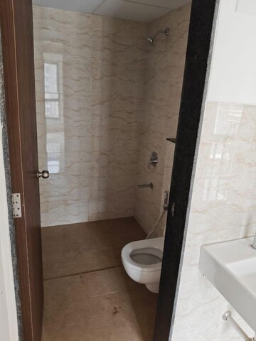 Bathroom in 2 BHK Apartment at Shapoorji Pallonji Sensorium, Hinjewadi – for Rent