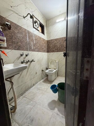 Bathroom in 1 BHK Builder Floor at Dwarka Mor – for Rent