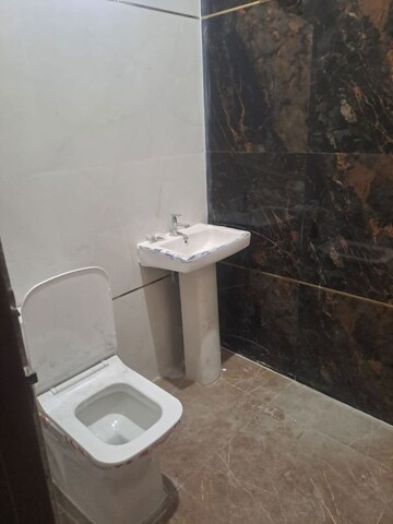 Bathroom in 2 BHK Apartment at Dhakoli – for Sale