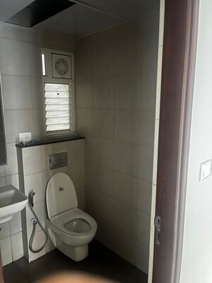 Bathroom in 2 BHK Apartment at Bhartiya Nikoo Homes Phase 2, Thanisandra Main Road – for Rent