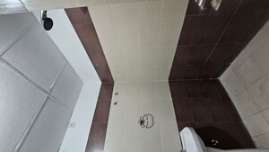 Bathroom in 4 BHK Apartment at Parsvnath Royale Floors, Uattardhona – for Rent