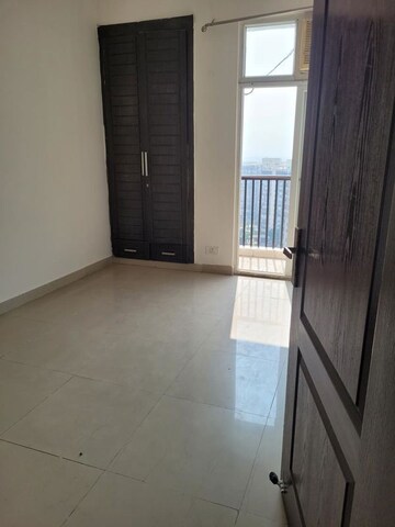 Room in 2 BHK Apartment at Prateek Wisteria, Sector 77 – for Rent