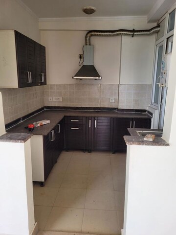 Kitchen in 2 BHK Apartment at Prateek Wisteria, Sector 77 – for Rent