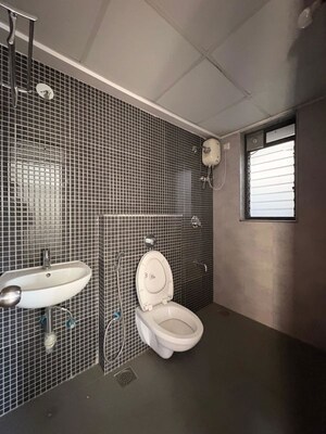 Bathroom in 2 BHK Apartment at Lodha Lakeshore Greens, Dombivli East – for Rent