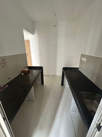 Kitchen in 2 BHK Apartment at Lodha Codename Premier, Dombivli East – for Rent