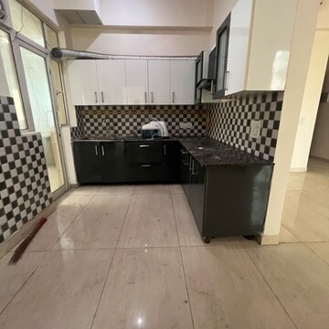 Kitchen in 3 BHK Apartment at Gaur Saundaryam, Haibatpur – for Rent