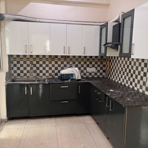 Kitchen in 3 BHK Apartment at Gaur Saundaryam, Haibatpur – for Rent