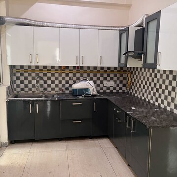 Kitchen in 3 BHK Apartment at Gaur Saundaryam, Haibatpur – for Rent