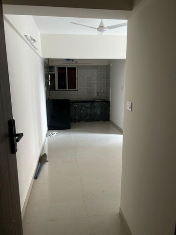 Building Lobby in 2 BHK Apartment at Paranjape Trident Towers, Wakad – for Rent