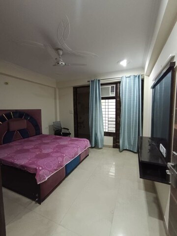 Bedroom in 3 BHK Builder Floor at Ansal Sushant Lok I, Sector 43 – for Rent