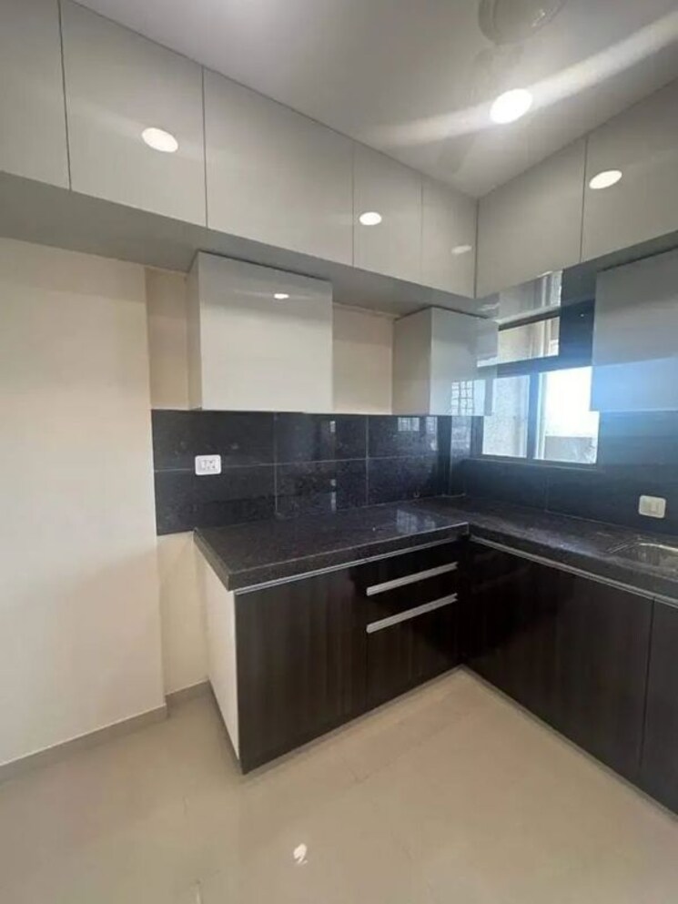 Kitchen, magarpatta-city-iris 2 Bedroom 1000 Sq.Ft. Apartment In Hadapsar Pune 9912124