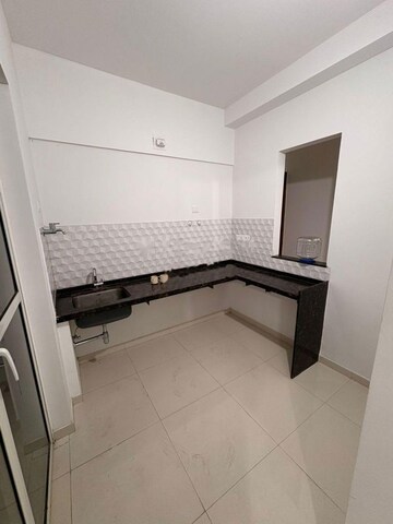 Kitchen in 2 BHK Apartment at Godrej Boulevard, Manjari – for Rent