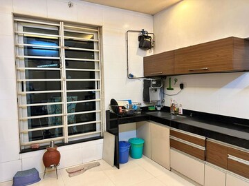 Kitchen in 4 BHK Apartment at Sheth Vasant Lawns, Laxmi Nagar – for Sale