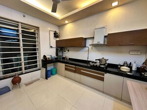 Kitchen in 4 BHK Apartment at Sheth Vasant Lawns, Laxmi Nagar – for Sale