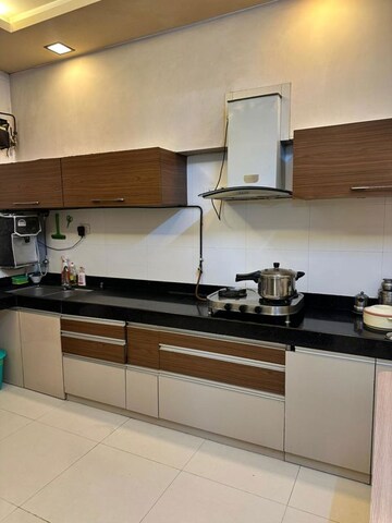 Kitchen in 4 BHK Apartment at Sheth Vasant Lawns, Laxmi Nagar – for Sale