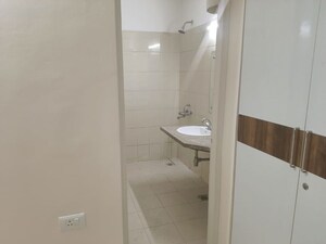 Bathroom in 2 BHK Apartment at Signature Global Orchard Avenue, Sector 93 – for Sale