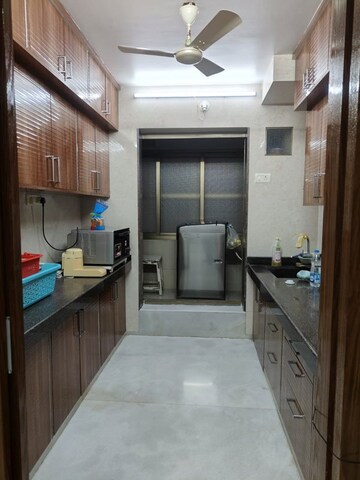 Kitchen in 1 BHK Apartment at Sai Palace CHS, Owale – for Sale
