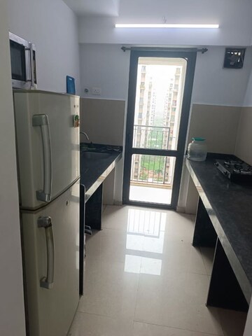 Kitchen in 1 BHK Apartment at Lodha Palava City Lakeshore Greens, Dombivli East – for Rent