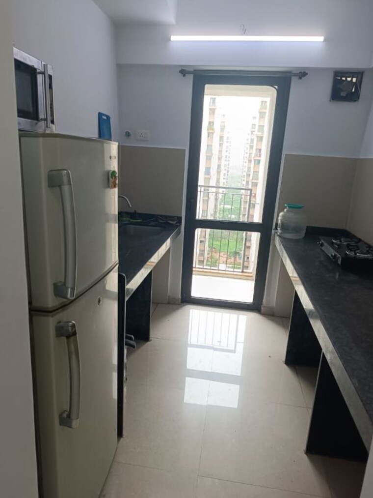 Kitchen, lodha-palava-city-lakeshore-greens 1 Bedroom 505 Sq.Ft. Apartment In Dombivli East Thane 9912489