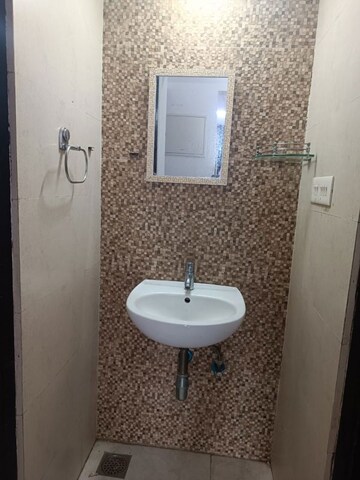 Bathroom in 1 BHK Apartment at Lodha Palava City Lakeshore Greens, Dombivli East – for Rent
