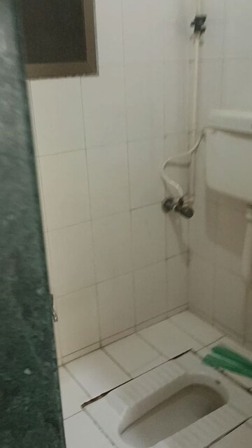 Bathroom in 2 BHK Builder Floor at Shantinagar CHS, Mira Road – for Rent