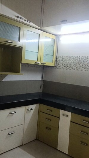 Kitchen in 2 BHK Builder Floor at Shantinagar CHS, Mira Road – for Rent