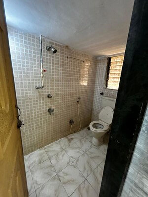 Bathroom in  Office Space at New Technocity CHS, T.T.C. Industrial Area – for Rent