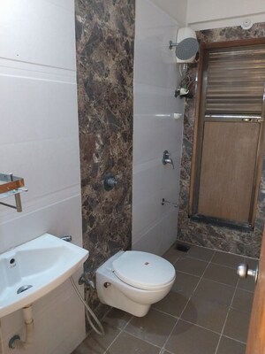 Bathroom in 2 BHK Apartment at Sethia Link View, Goregaon West – for Rent