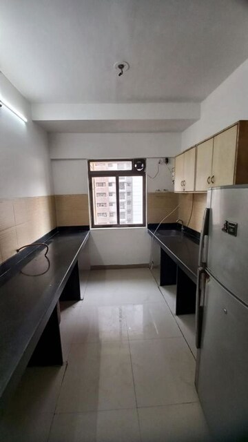 Kitchen in 3 BHK Apartment at Acme Ozone Oakwood and Ashwood, Manpada – for Sale