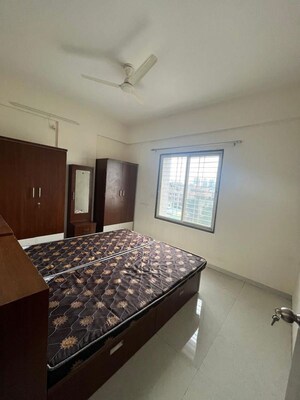 Bedroom in 1 BHK Apartment at Wadgaon Sheri – for Rent