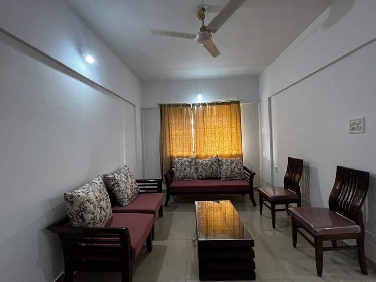 Living Room, magarpatta-city-heliconia 1 Bedroom 700 Sq.Ft. Apartment In Hadapsar Pune 9912833