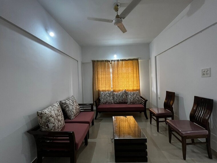 Living Room, magarpatta-city-heliconia 1 Bedroom 700 Sq.Ft. Apartment In Hadapsar Pune 9912833