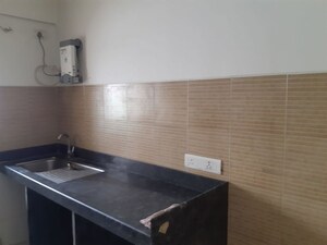 Kitchen in 3 BHK Apartment at Palacia Kingston Phase 2, Ghodbunder Road – for Sale