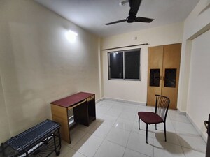 Living Room in 1 BHK Apartment at Raunak Heights, Ghodbunder Road – for Sale