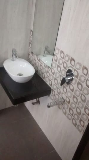 Bathroom in 2 BHK Apartment at Shreedham Splendour, Andheri West – for Rent