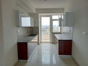 Kitchen in 3 BHK Apartment at Hermitage Centralis, Vip Road – for Sale
