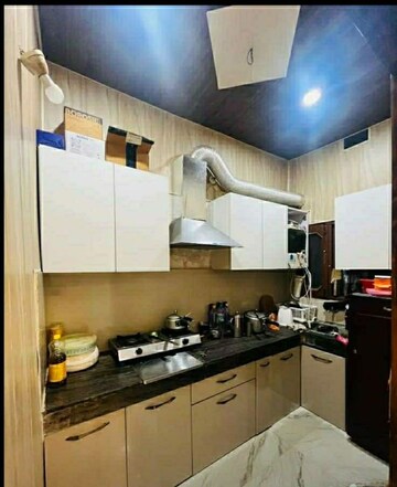 Kitchen in 2 BHK Builder Floor at Dhakoli – for Sale